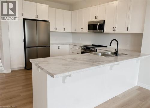 57 Lloyd Davies Way, Binbrook, ON - Indoor Photo Showing Kitchen With Double Sink