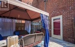 Summer image of the back porch with gazebo - 