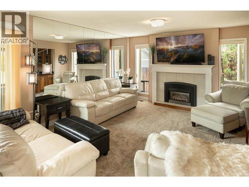 3970 June Springs Road, Kelowna, BC - Indoor Photo Showing Living Room With Fireplace