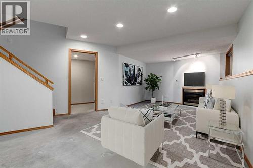 20 Willowbrook Gate Nw, Airdrie, AB - Indoor With Fireplace