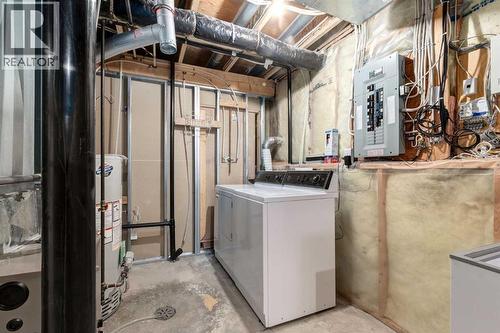 20 Willowbrook Gate Nw, Airdrie, AB - Indoor Photo Showing Laundry Room