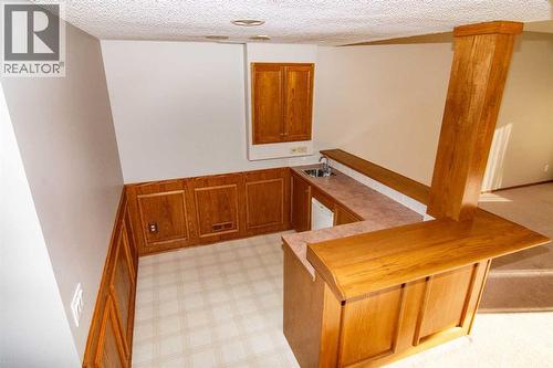 16 Eagleview Heights Nw, Cochrane, AB - Indoor Photo Showing Other Room