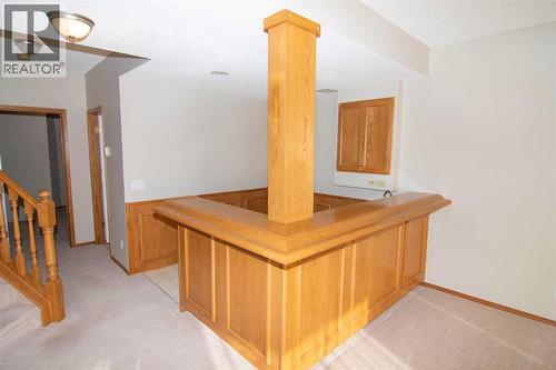 Bar Area - Lower - 16 Eagleview Heights Nw, Cochrane, AB - Indoor Photo Showing Other Room
