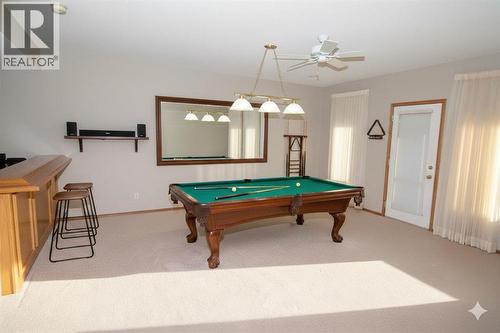 Recreation Area - Virtual Staging - 16 Eagleview Heights Nw, Cochrane, AB - Indoor Photo Showing Other Room