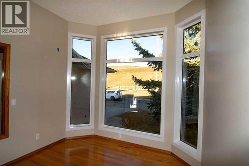 Den - 16 Eagleview Heights Nw, Cochrane, AB - Indoor Photo Showing Other Room
