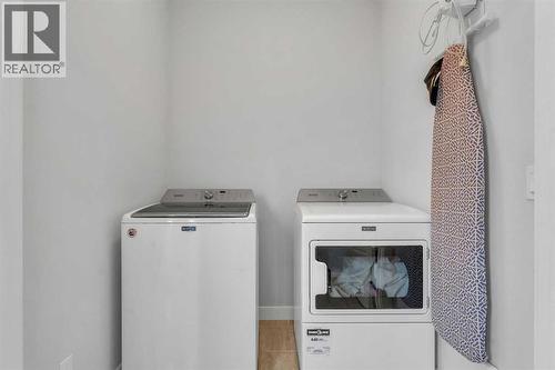 7 Corner Meadows Common Ne, Calgary, AB - Indoor Photo Showing Laundry Room