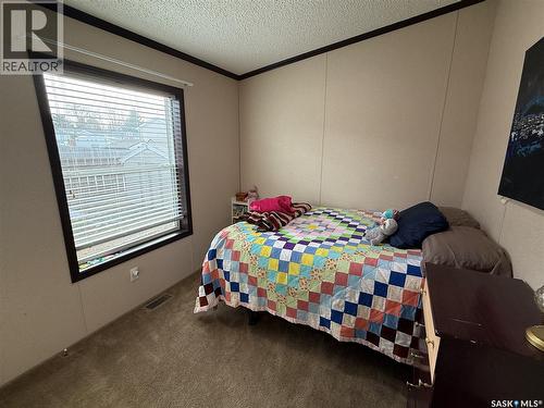4 7Th Avenue Se, Weyburn, SK - Indoor Photo Showing Bedroom