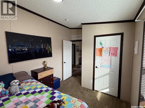 4 7Th Avenue Se, Weyburn, SK - Indoor Photo Showing Bedroom