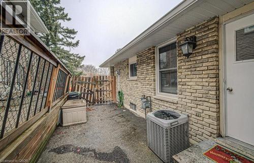View of patio / terrace featuring a gate - 310 Magnolia Drive, Hamilton, ON 