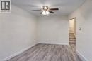 Spare room with light wood-type flooring and a ceiling fan - 310 Magnolia Drive, Hamilton, ON  - Indoor Photo Showing Other Room 