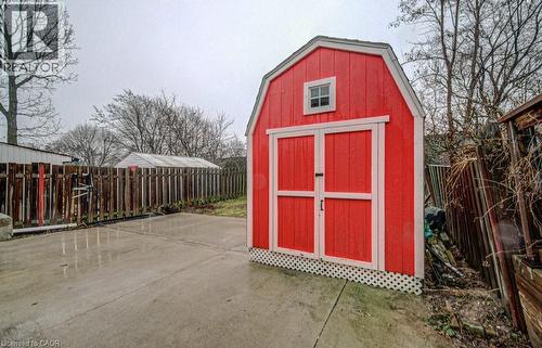 View of shed with a fenced backyard - 310 Magnolia Drive, Hamilton, ON 