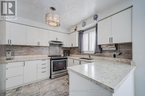 5128 Guildwood Way, Mississauga, ON - Indoor Photo Showing Kitchen With Double Sink With Upgraded Kitchen