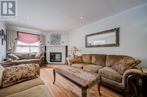 5128 Guildwood Way, Mississauga, ON - Indoor Photo Showing Living Room With Fireplace
