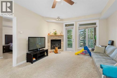 8103, 14 Hemlock Crescent Sw, Calgary, AB - Indoor Photo Showing Living Room