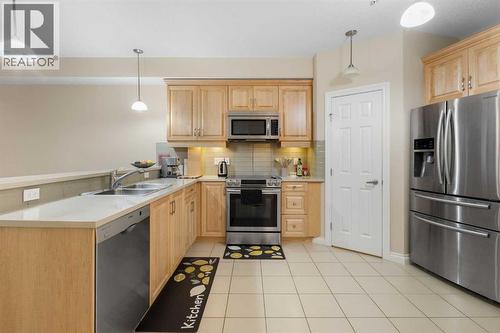 8103, 14 Hemlock Crescent Sw, Calgary, AB - Indoor Photo Showing Kitchen With Stainless Steel Kitchen With Double Sink