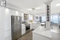 Stainless Steel Appliances With Quartz Counters - 
