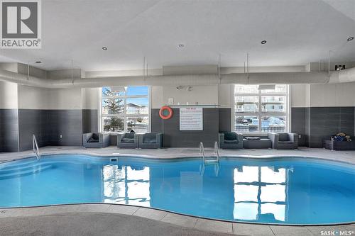 112 1545 Neville Drive, Regina, SK - Indoor Photo Showing Other Room With In Ground Pool