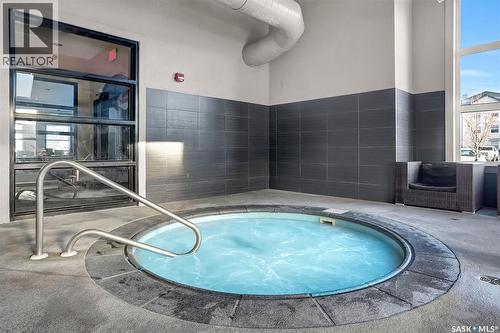 112 1545 Neville Drive, Regina, SK - Indoor Photo Showing Other Room With In Ground Pool