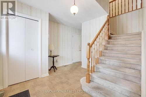 Foyer. Stair treads are wood parquet - 935 Parkhaven Avenue, Ottawa, ON - Indoor Photo Showing Other Room