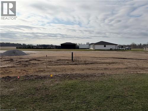 View of yard with an outbuilding and a pole building - 6 Priddle Drive, Langton, ON 