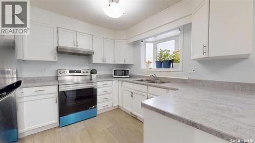 6519 Whelan Drive, Regina, SK - Indoor Photo Showing Kitchen With Double Sink