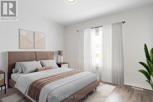 Virtually Staged - 50 Breithaupt Crescent, Tiny, ON - Indoor Photo Showing Bedroom