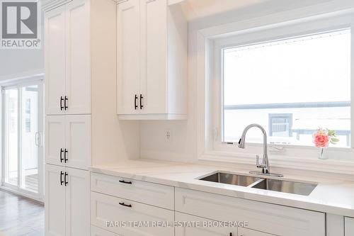 50 Breithaupt Crescent, Tiny, ON - Indoor Photo Showing Kitchen With Double Sink