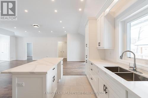 50 Breithaupt Crescent, Tiny, ON - Indoor Photo Showing Kitchen With Double Sink