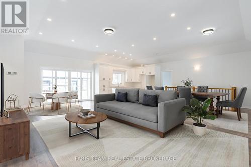 Virtually Staged - 50 Breithaupt Crescent, Tiny, ON - Indoor Photo Showing Living Room