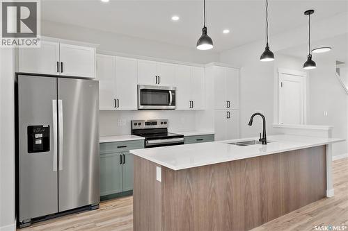 7748 Mapleford Boulevard, Regina, SK - Indoor Photo Showing Kitchen With Double Sink With Upgraded Kitchen