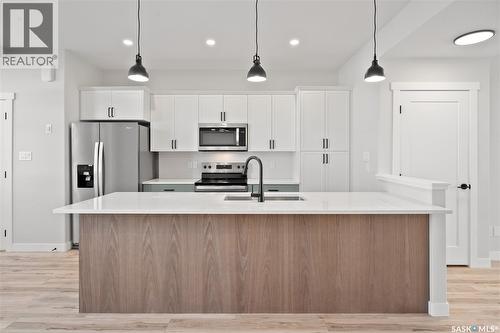7748 Mapleford Boulevard, Regina, SK - Indoor Photo Showing Kitchen With Upgraded Kitchen