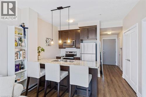 16 Concord Place Unit# 705, Grimsby, ON - Indoor Photo Showing Kitchen With Double Sink