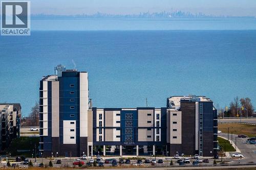 16 Concord Place Unit# 705, Grimsby, ON - Outdoor With Body Of Water With Facade