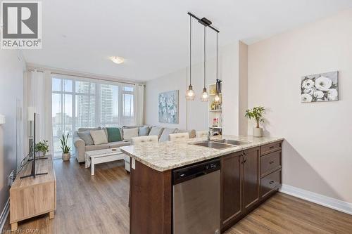 16 Concord Place Unit# 705, Grimsby, ON - Indoor Photo Showing Kitchen With Double Sink