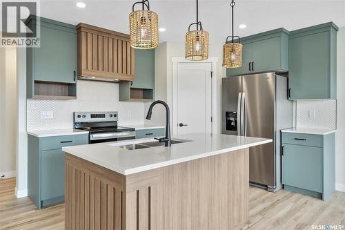 3000 Dumont Way, Regina, SK - Indoor Photo Showing Kitchen With Upgraded Kitchen