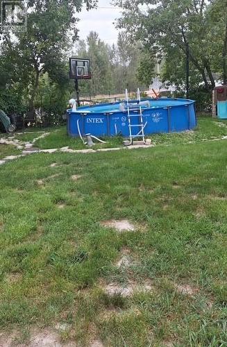 51 Devouna Street, Garson, ON - Outdoor With Above Ground Pool With Backyard