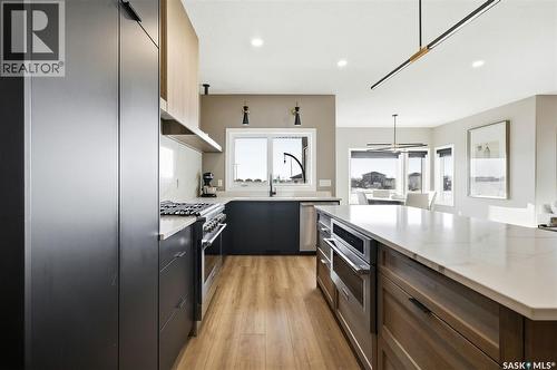 13 Plains Green, Pilot Butte, SK - Indoor Photo Showing Kitchen With Upgraded Kitchen