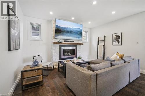 4 Rembe Avenue, Hamilton, ON - Indoor Photo Showing Living Room With Fireplace