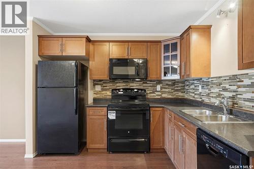 103 225 Hassard Close, Saskatoon, SK - Indoor Photo Showing Kitchen With Double Sink