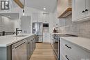131 Katz Avenue, Saskatoon, SK  - Indoor Photo Showing Kitchen With Double Sink With Upgraded Kitchen 
