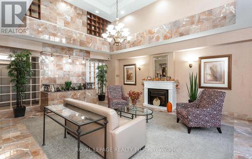 803 - 5 Lisa Street, Brampton, ON - Indoor With Fireplace