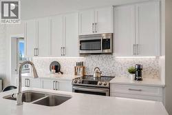 318, 8530 8A Avenue SW  Calgary, AB T3H 6A7