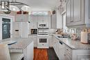 910 Roth Terrace, Rosthern, SK  - Indoor Photo Showing Kitchen With Double Sink 