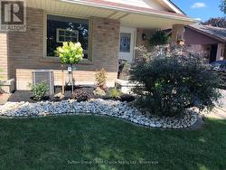 Summer pic of Front Elevation - 