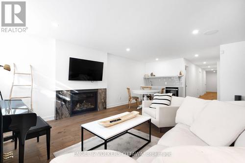 508 Roosevelt Avenue, Ottawa, ON - Indoor Photo Showing Living Room With Fireplace