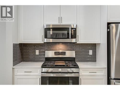 Kitchen - 1164 Black Mountain Drive, Kelowna, BC - Indoor Photo Showing Kitchen With Stainless Steel Kitchen With Upgraded Kitchen