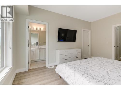 Primary bedroom - 1164 Black Mountain Drive, Kelowna, BC - Indoor Photo Showing Bedroom