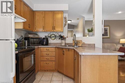 10 Cadham Boulevard Unit# 29, Hamilton, ON - Indoor Photo Showing Kitchen With Double Sink