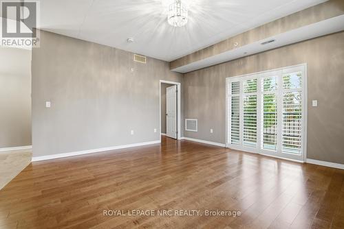 Patio dr to Balcony, California Shutter Doors - 203 - 16 Sullivan Avenue, Thorold (Thorold Downtown), ON - Indoor Photo Showing Other Room