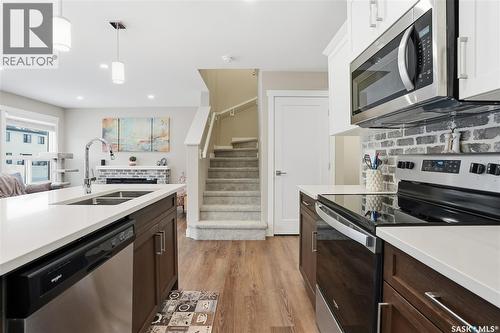 474 Schmeiser Bend, Saskatoon, SK - Indoor Photo Showing Kitchen With Stainless Steel Kitchen With Double Sink With Upgraded Kitchen